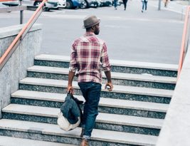 Young Handsome Afro Black Man Going Upstairs